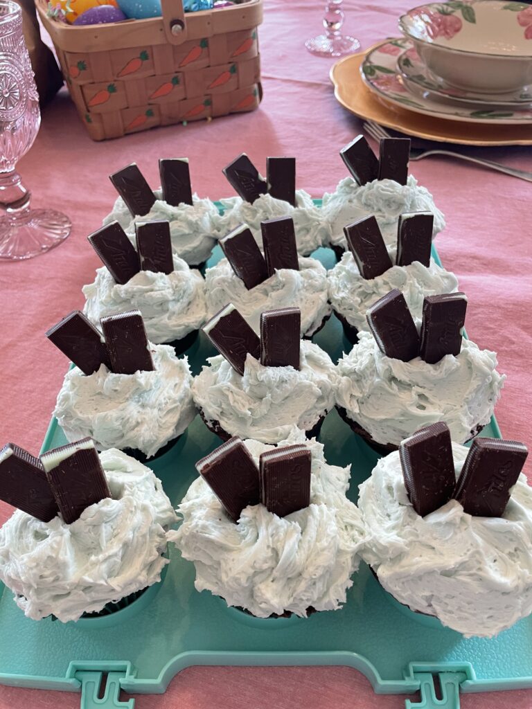 12 chocolate mint cupcakes topped with Andes mints