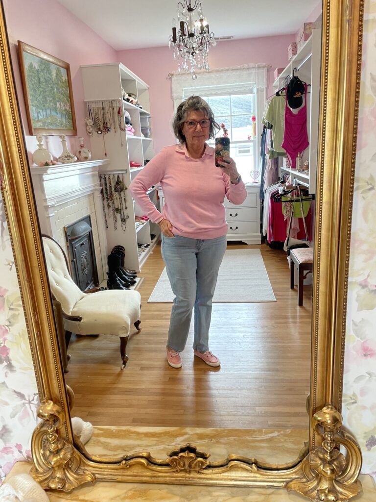 Spring outfit, light denim levi jeans, pink sweater and pink and white stripe blouse