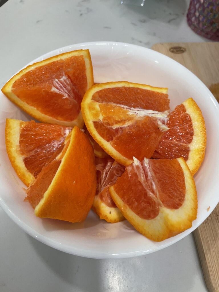 white bowl with cara cara oranges