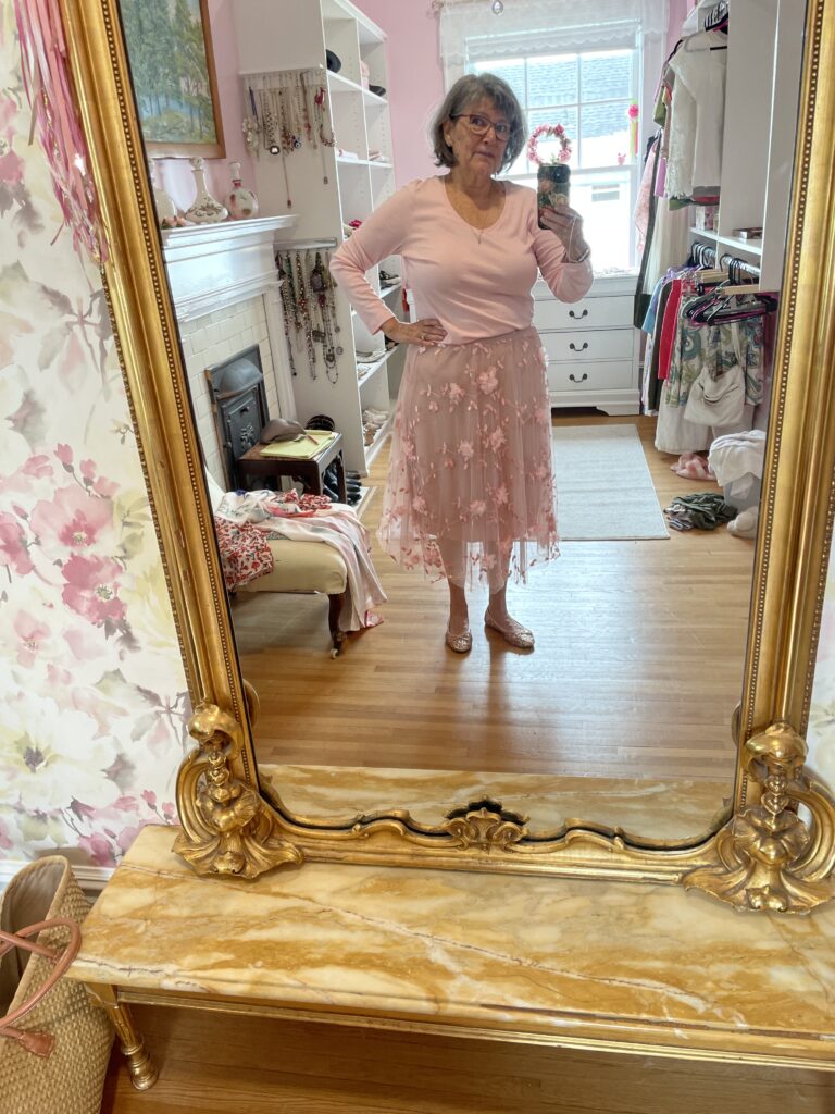 May 21 pound weight loss. Angelina wearing a pink top and tulle skirt.